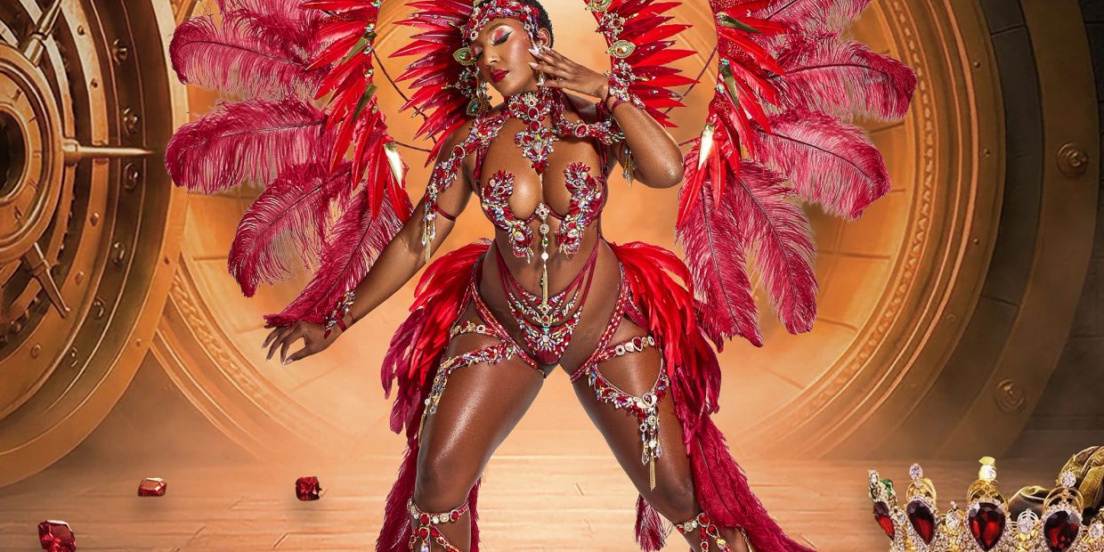 Woman in elaborate red feathered costume stands in front of a vault door.