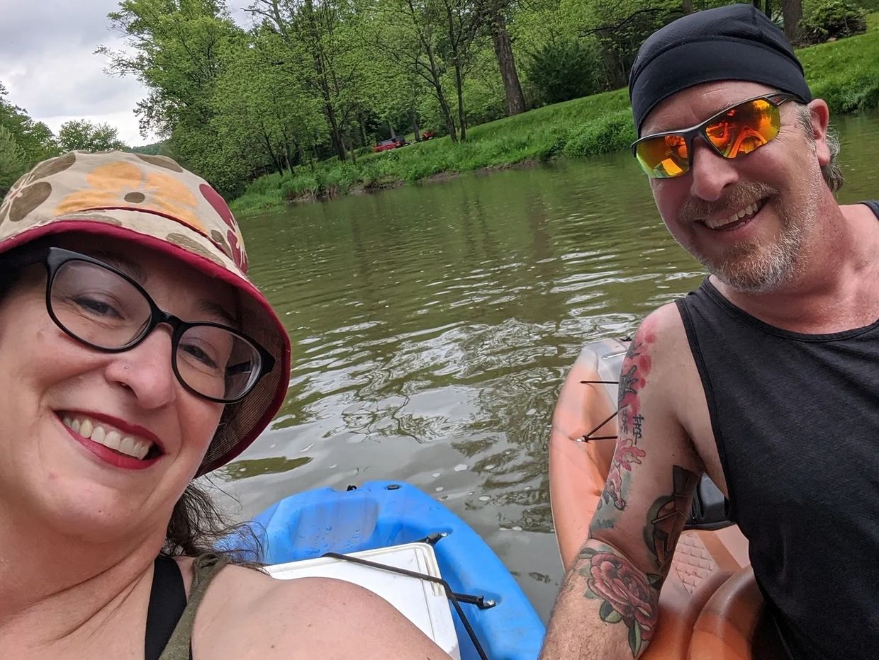 Dr Rob and Judy Fair kayaking on Buffalo Creek 