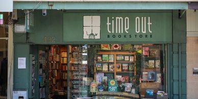 Mt Eden Time Out Bookstore shop front with books displayed outside 