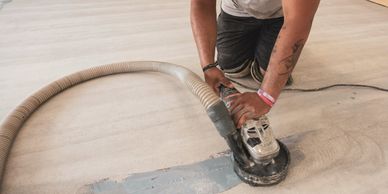 Finishing a crack repair, a worker ensures the surface is prepared for the next coating step.