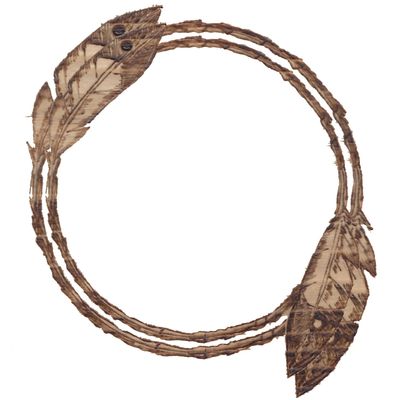 Circular feather wreath made of natural twine and leaves.