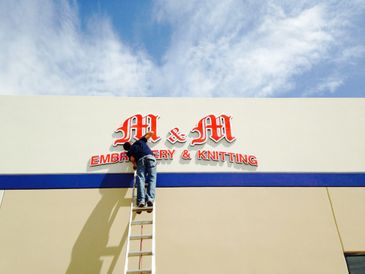 Exterior foam building sign installed 