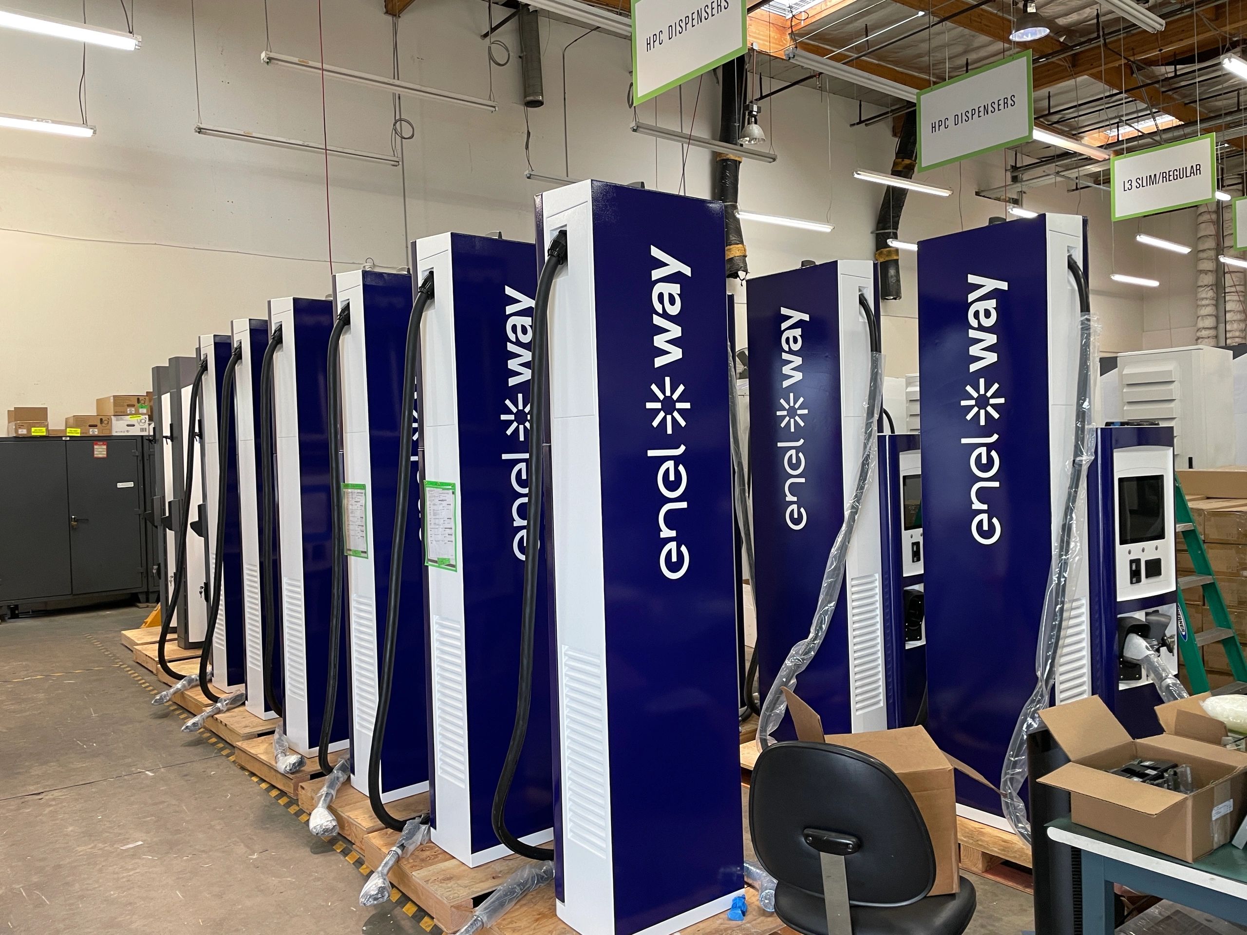 EV charging machines with vinyl graphics installed to enhance brand recognition. EV Marketing wrap