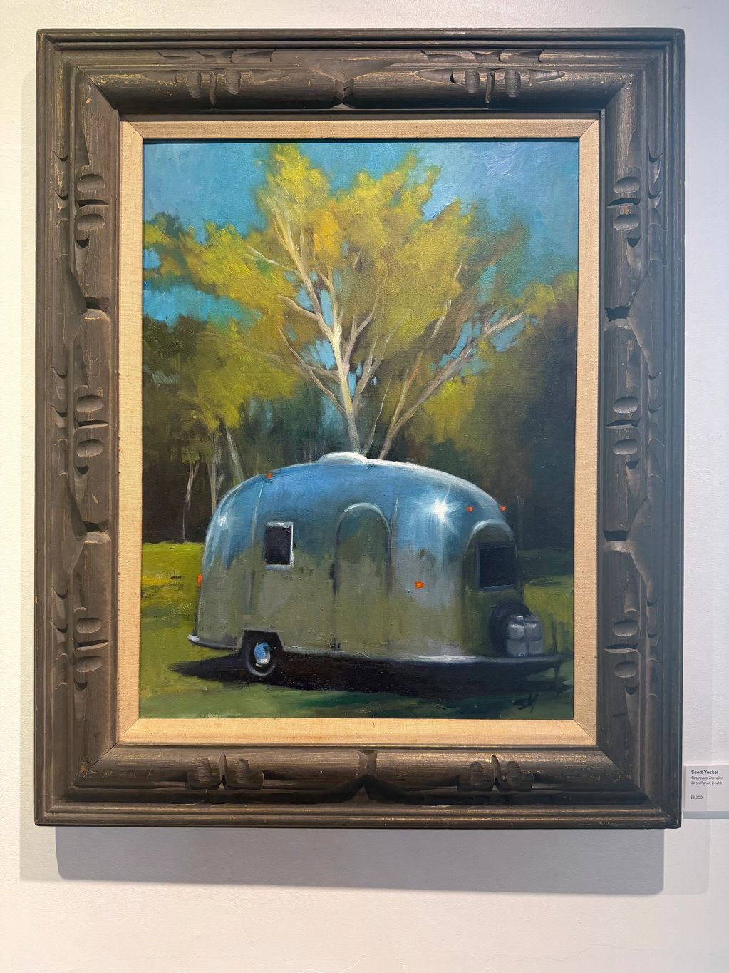 Oil painting of a shiny Airstream trailer under bright trees.