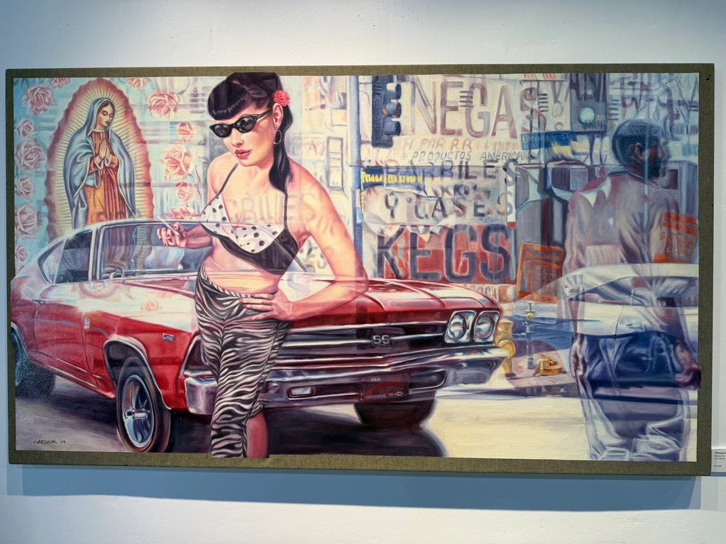 Retro woman in sunglasses poses by a red classic car with a street and shrine backdrop.