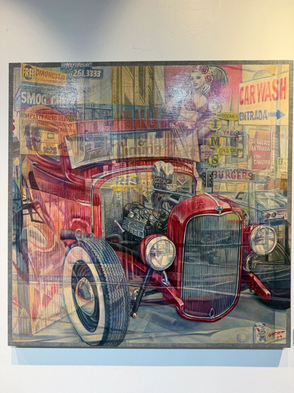 A vibrant painting of a classic red hot rod car amidst urban signs and a pin-up girl.