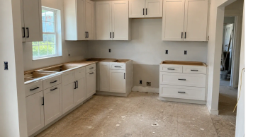 New kitchen cabinets installation in progress.