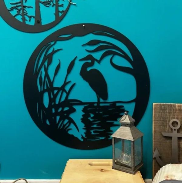 heron in a circle, metal art, island metal arts, pond scene