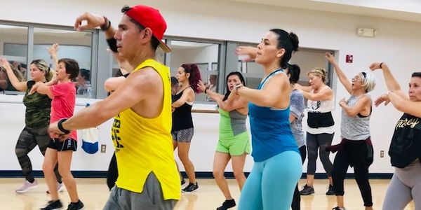 Zumba by Fernando class showing group of participants doing Zumba at the North Shore Studio Miami Be