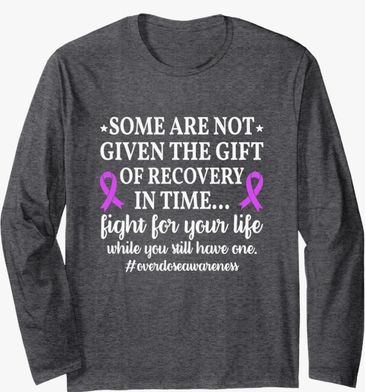 Grey long sleeved shirt,  we don't all get the chance to recover. 