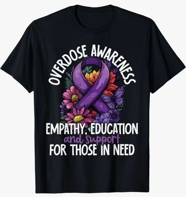 Comes in black, white, or gray. Sizes XS-2XL. 100% pre-shrunk cotton. 