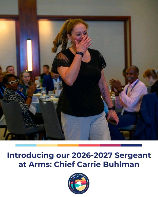 Chief Carrie Buhlman introduced as 2026-2027 Sergeant at Arms with applause.