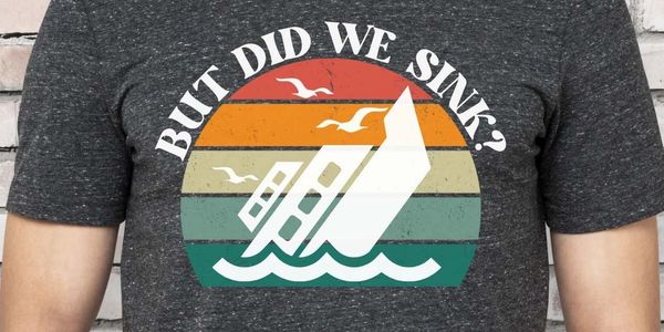 But Did We Sink? Nautical graphic t-shirt for men and women. Retro colors, sinking boat silhouette 