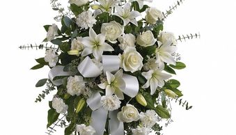 Elegant Funeral Standing Sprays provide a personalized tribute and living memorial.