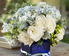 Send a heartfelt expression of your sympathies with an original vase arrangement.