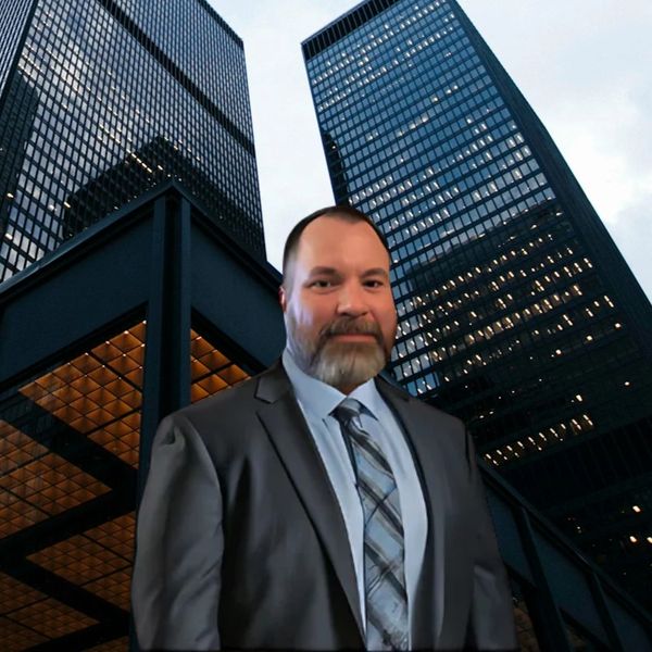 Founder Aaron Hubbard in a suit and tie