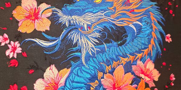 Embroidered image  of a dragon