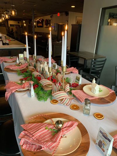 long table with festive place settings