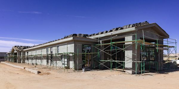 A building under construction with scaffolding around it.