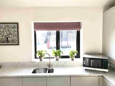 Pink roman blind