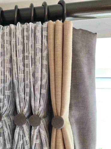 bespoke, interlined, double pleated curtains with contrasting leading edge and contrast first pleat 