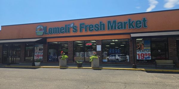 Front building shot at Lomeli's Fresh Market in Island Lake IL Mchenry County. Grocery shopping cent
