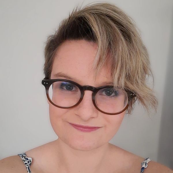 Megan Muyres, an artist with glasses and short hair