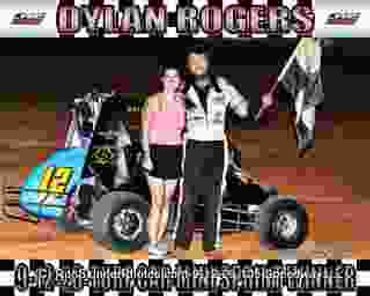 Racecar driver Dylan Rogers celebrating a win with a woman.