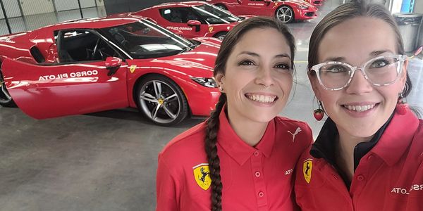 Thomas & Hobbs Marketing brand ambassadors in Ferrari-branded polos at a Ferrari brand activation ev