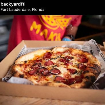 Serving up pies at the Back Yard Fort Lauderdale