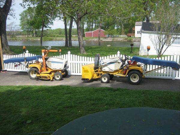 Alpha, and Bravo PRONETRACTORS. One set up for snow the other set up for mowing the lawn.