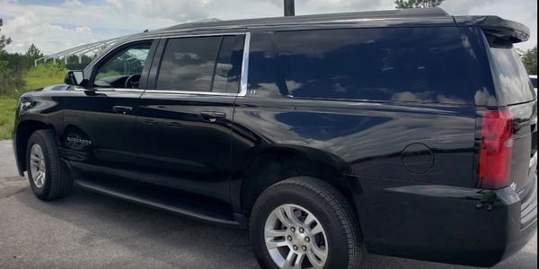 Side view of the black color car on the display