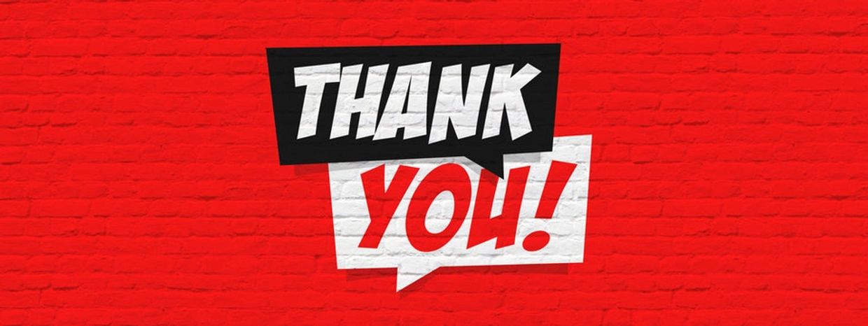 Bold "Thank You!" text on a red brick wall background.