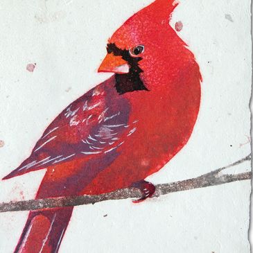"The Messenger," male northern cardinal, flax pulp painting on handmade paper by Don Widmer