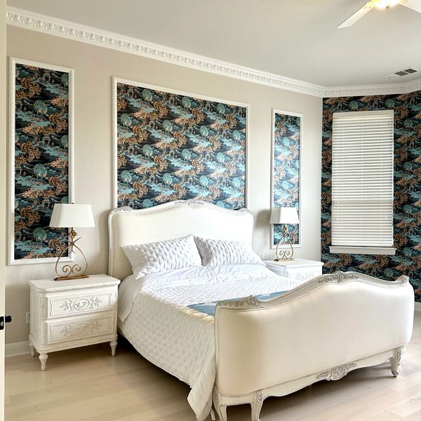 Wallpapered accent wall in the bedroom