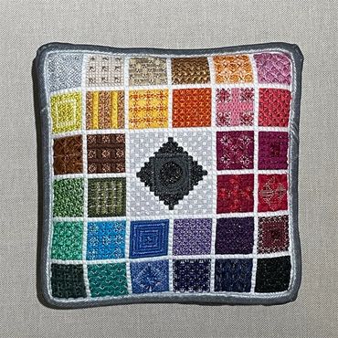 example of Needlepoint finishing of a box pillow 