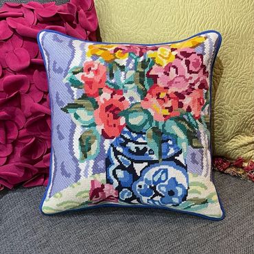 example of needlepoint pillow finished with contrast welting