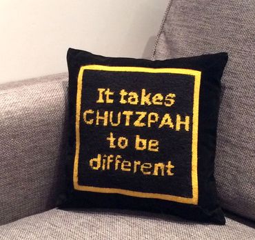 It takes chutzpah to be different. Needlepoint canvas inset into a knife edge pillow