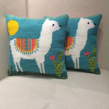 Knife edge needlepoint pillows.