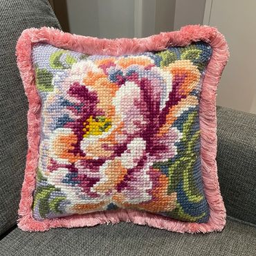 Example of needlepoint pillow finishing with fringe