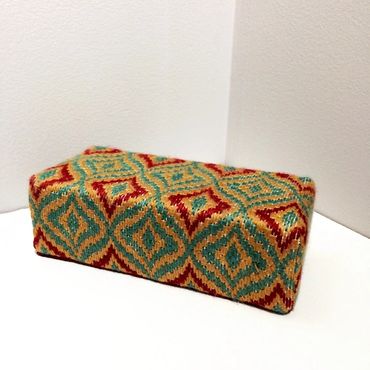 Example of finished bargello brick cover doorstop.