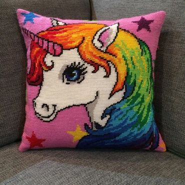 Our needlepoint finisher made this vibrant unicorn knife edge pillow for customer's granddaughter.