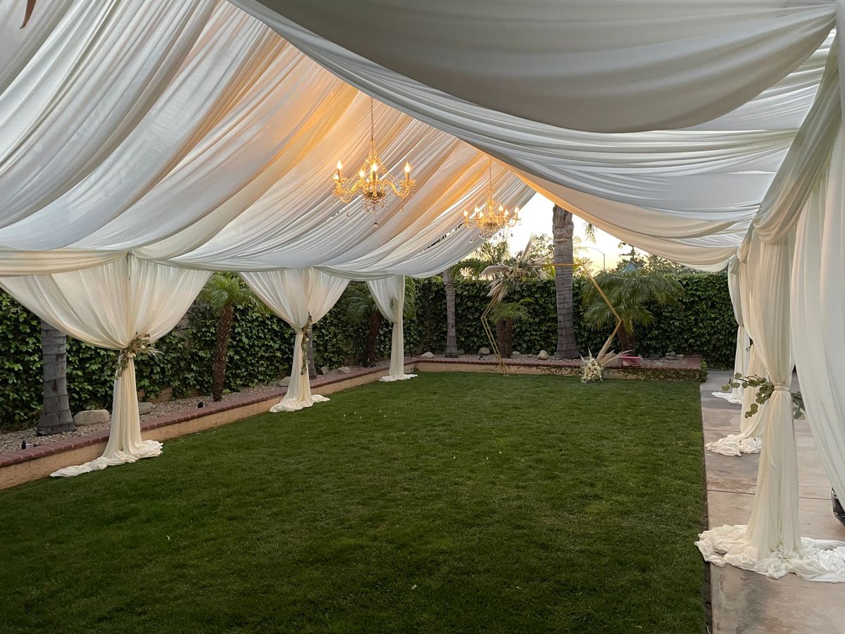 20x30 Ivory Naked Draped Tent with chandeliers