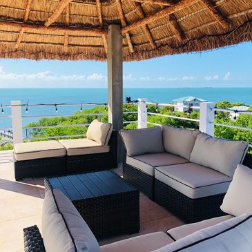 Enjoy the warm  Caribbean breezes under the rooftop palapa!