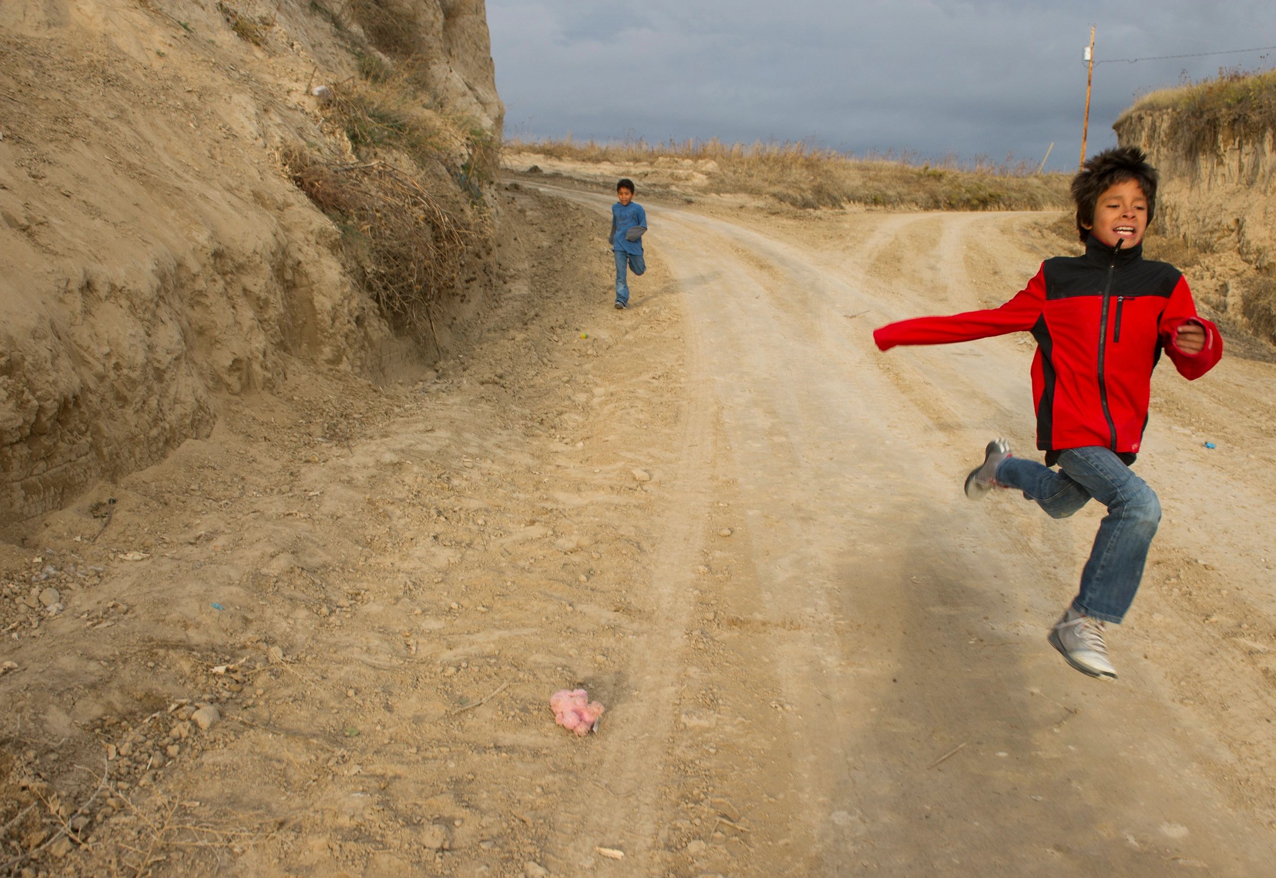 Legend Tell Tobacco, 10, races a friend on the Pine Ridge Reservation. --Swikar Patel/Education Week