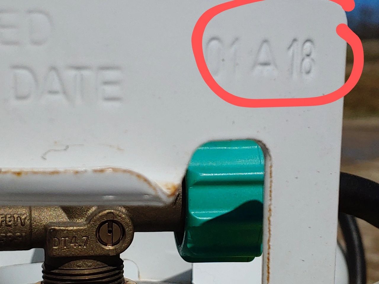 Image close up of DOT Date on cylinder