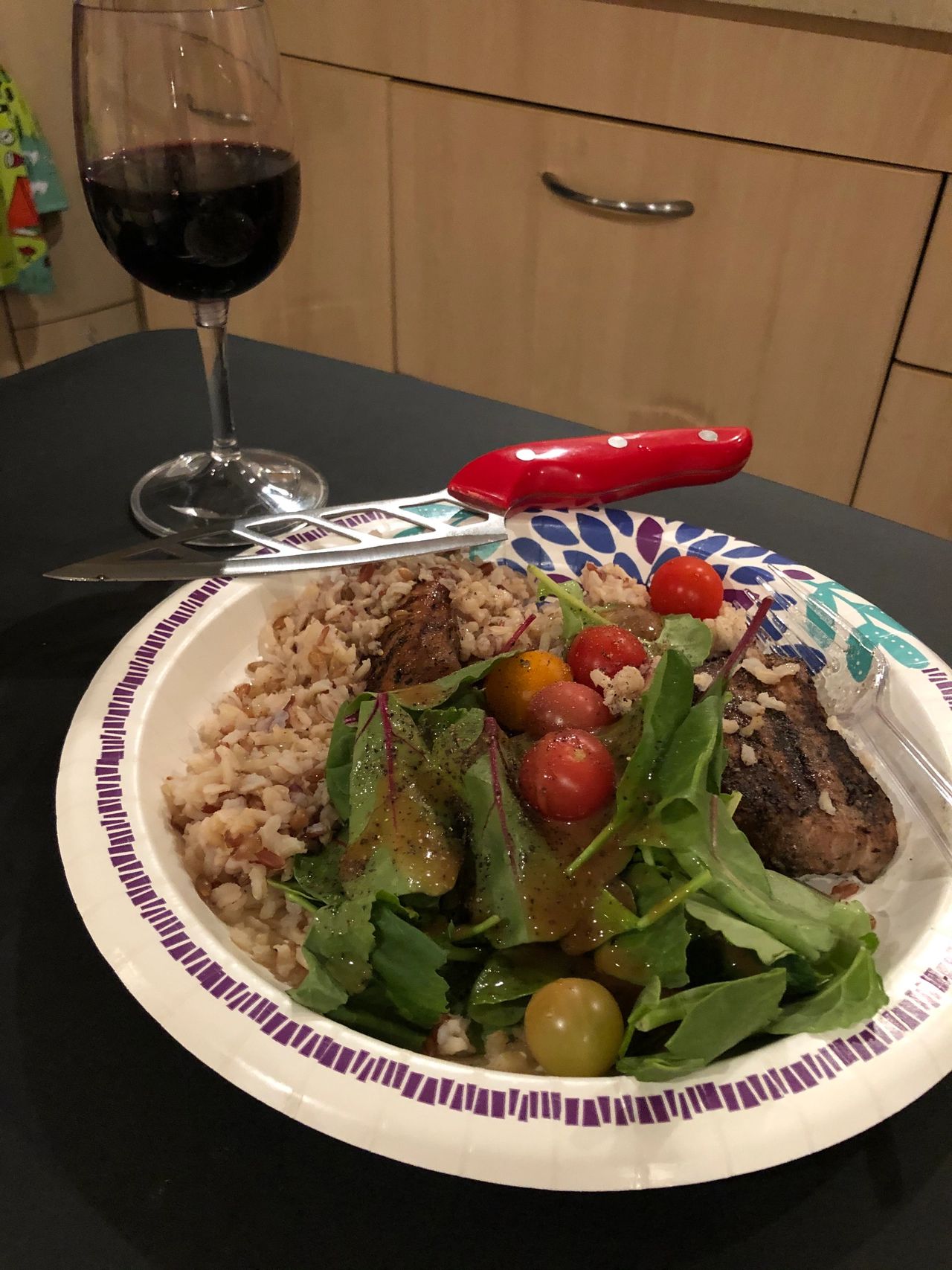 Pork tenderloin chops with salad and brown rice