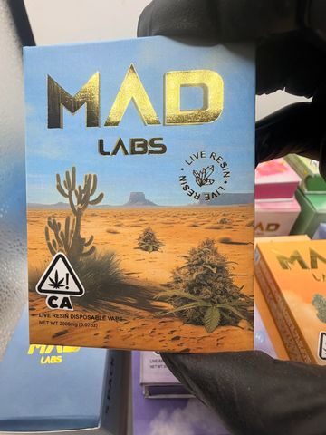 MAD Labs cannabis live resin disposable vape packaging with desert design.