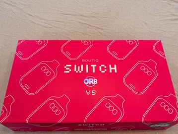 Red box with 'Switch Orb V5' branding and bottle illustrations.