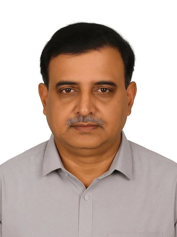 Portrait of a middle-aged man with a serious expression.